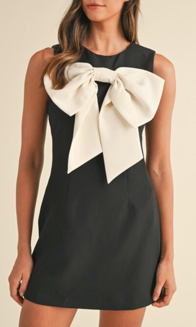 Vestido mini sin mangas con cuello redondo, apliques de lazo en contraste negro