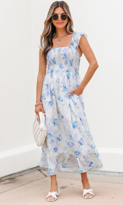 Vestido largo con cintura alta, doble volante con estampado floral azul cielo