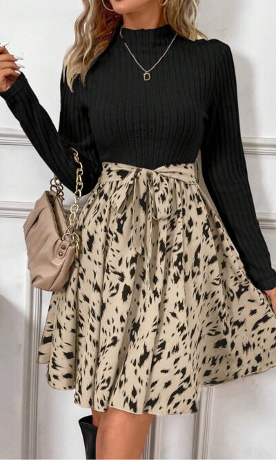 Vestido acampanado con cinturón, estampado punto acanalado negro